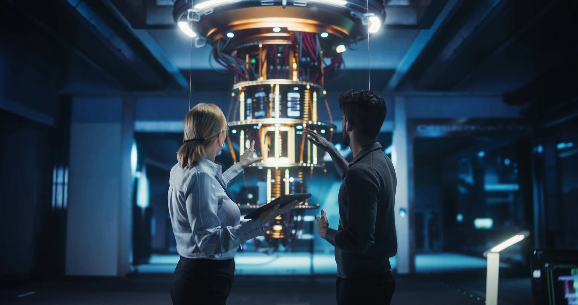 Engineers observing quantum computing chamber