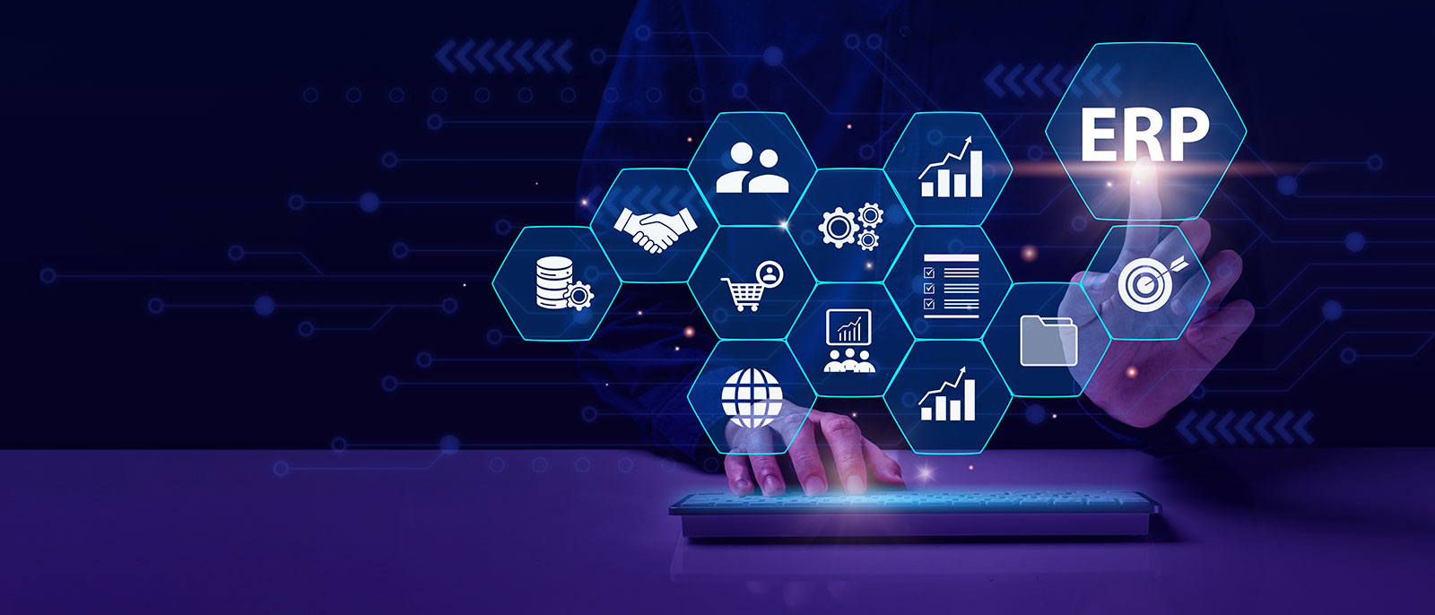 Hands typing on tablet with glowing ERP system icons for enterprise resource planning