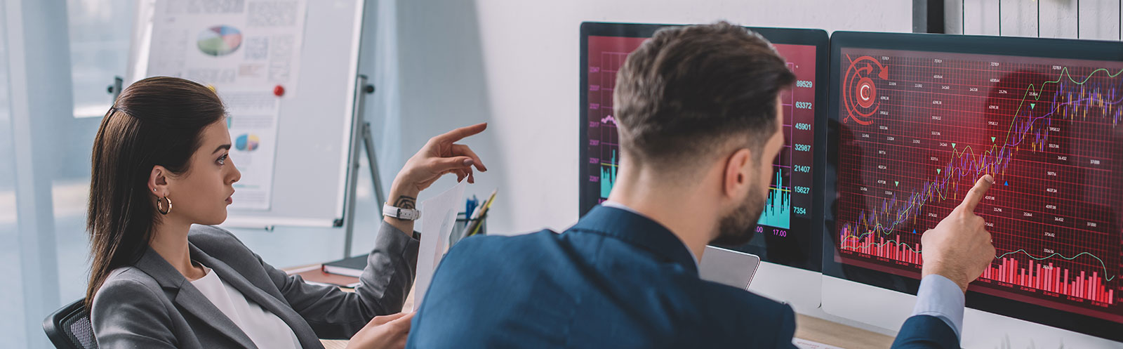 QA experts reviewing digital experience testing data and software quality assurance metrics