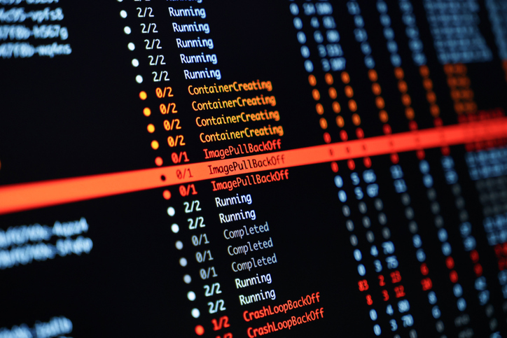 Test automation script execution logs on screen representing automated regression testing and QA automation services