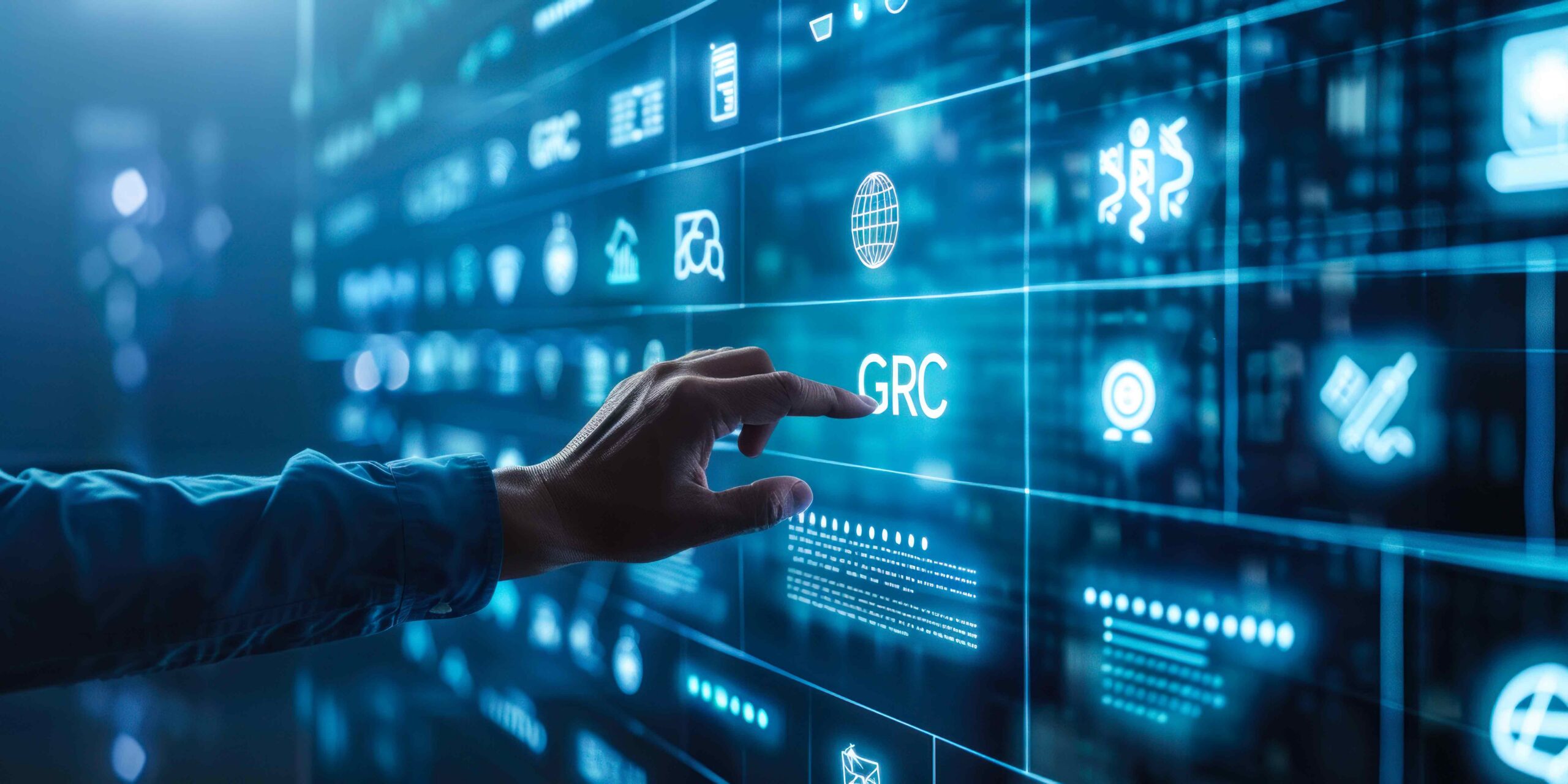 Man-touching-business-operations-GRC-button-on-screen