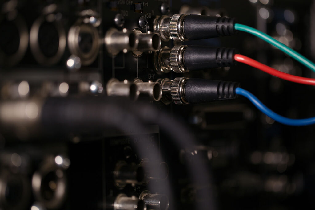 HbbTV broadcast cable connections and Ligada iSuite hardware testing equipment