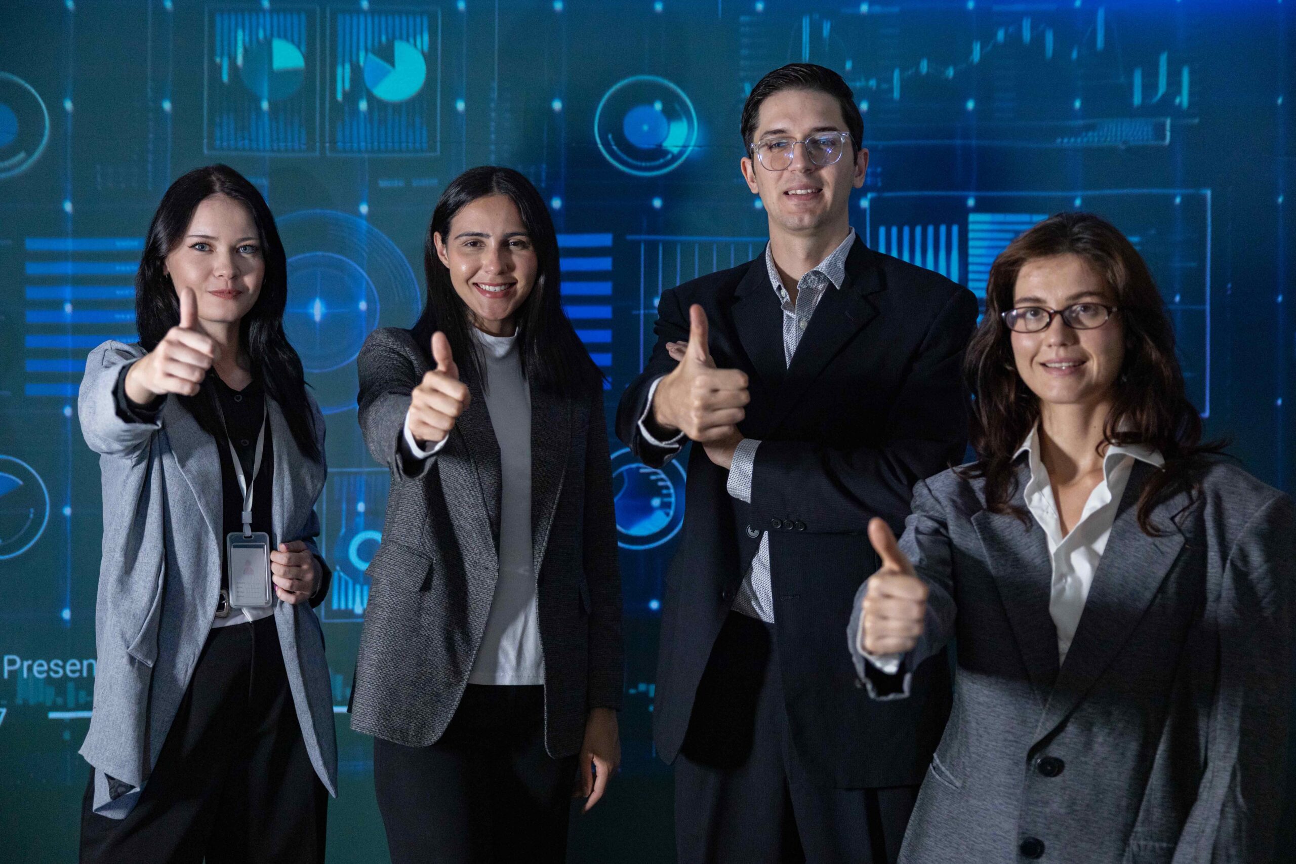 Team-celebrating-AI-compliance-with-thumbs-ups