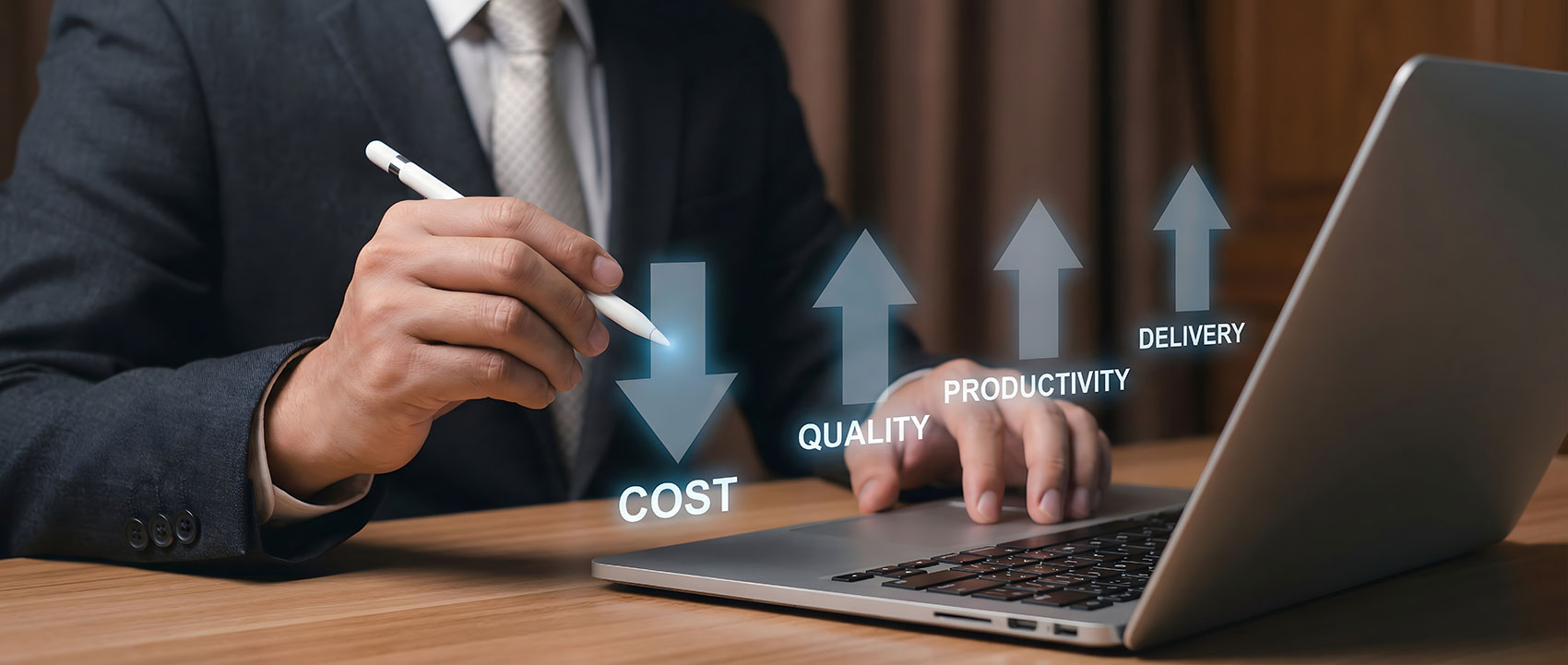 Businessman with laptop showing cost quality and productivity growth arrows