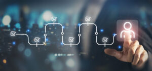 Person interacting with digital workflow icons representing user experience and accessibility testing