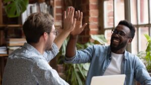 People-clapping-hands-to-celebrate-business-success