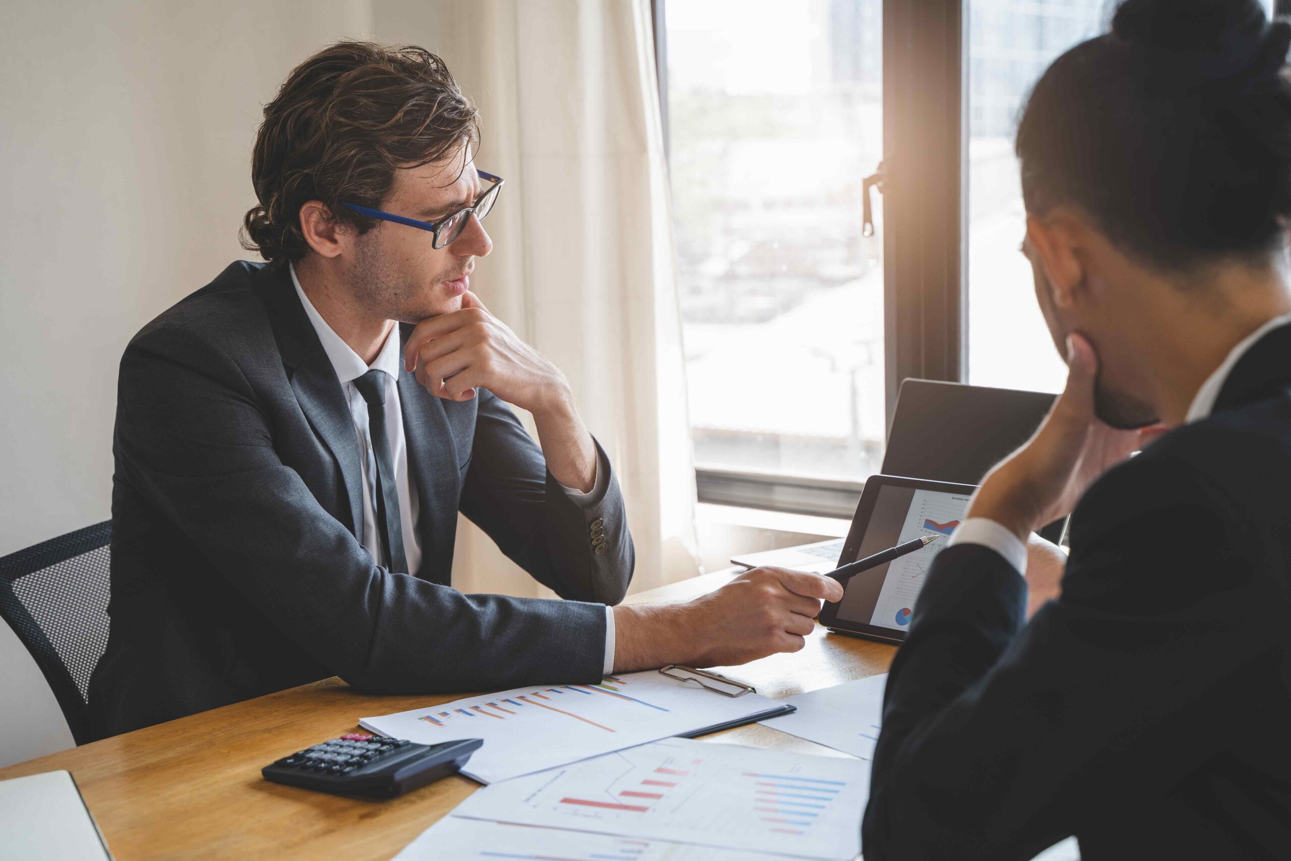 Executives discussing AI governance risk compliance and responsible AI advisory solutions