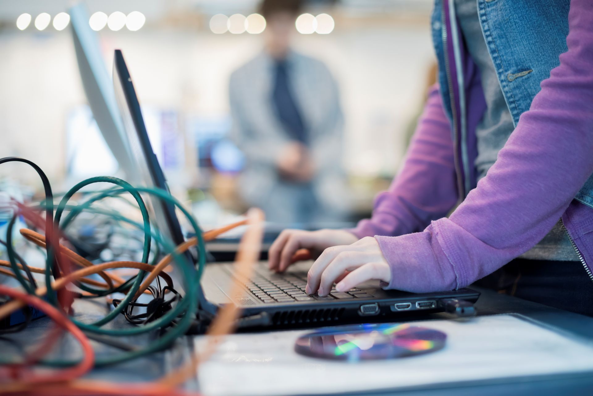 Engineer configuring hardware testing equipment