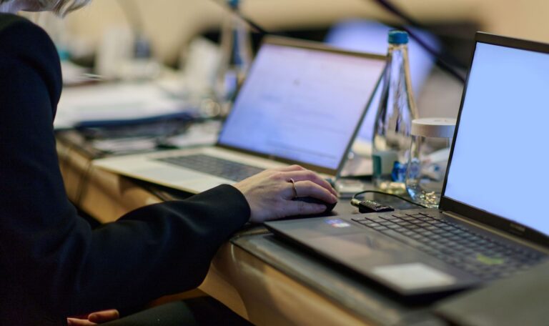 Software engineer reviewing application functionality and executing functional testing activities
