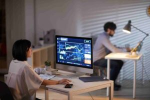Business colleagues analyze stock market data at n 2026 03 18 15 47 25 utc