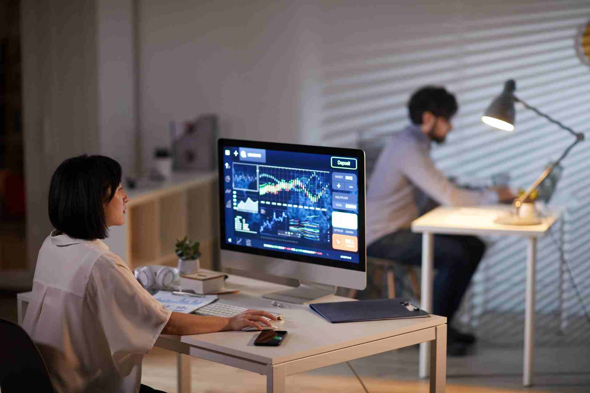 Business colleagues analyze stock market data at n 2026 03 18 15 47 25 utc