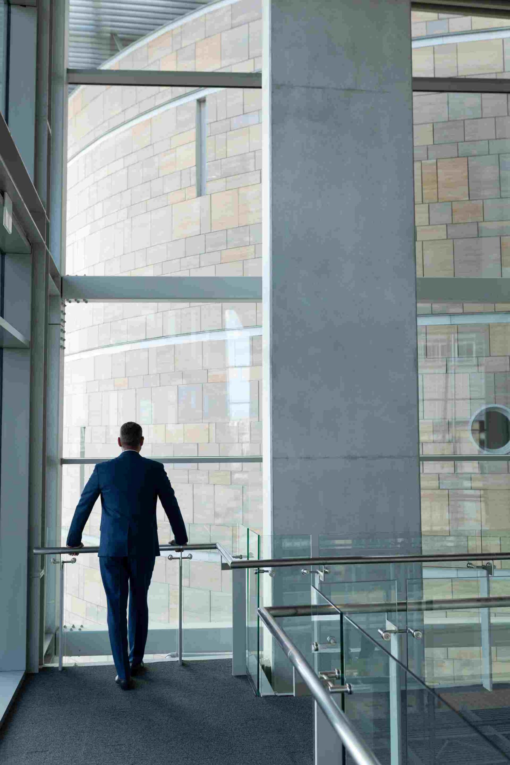 Businessman on the first floor of office and leane 2026 01 09 10 21 15 utc scaled
