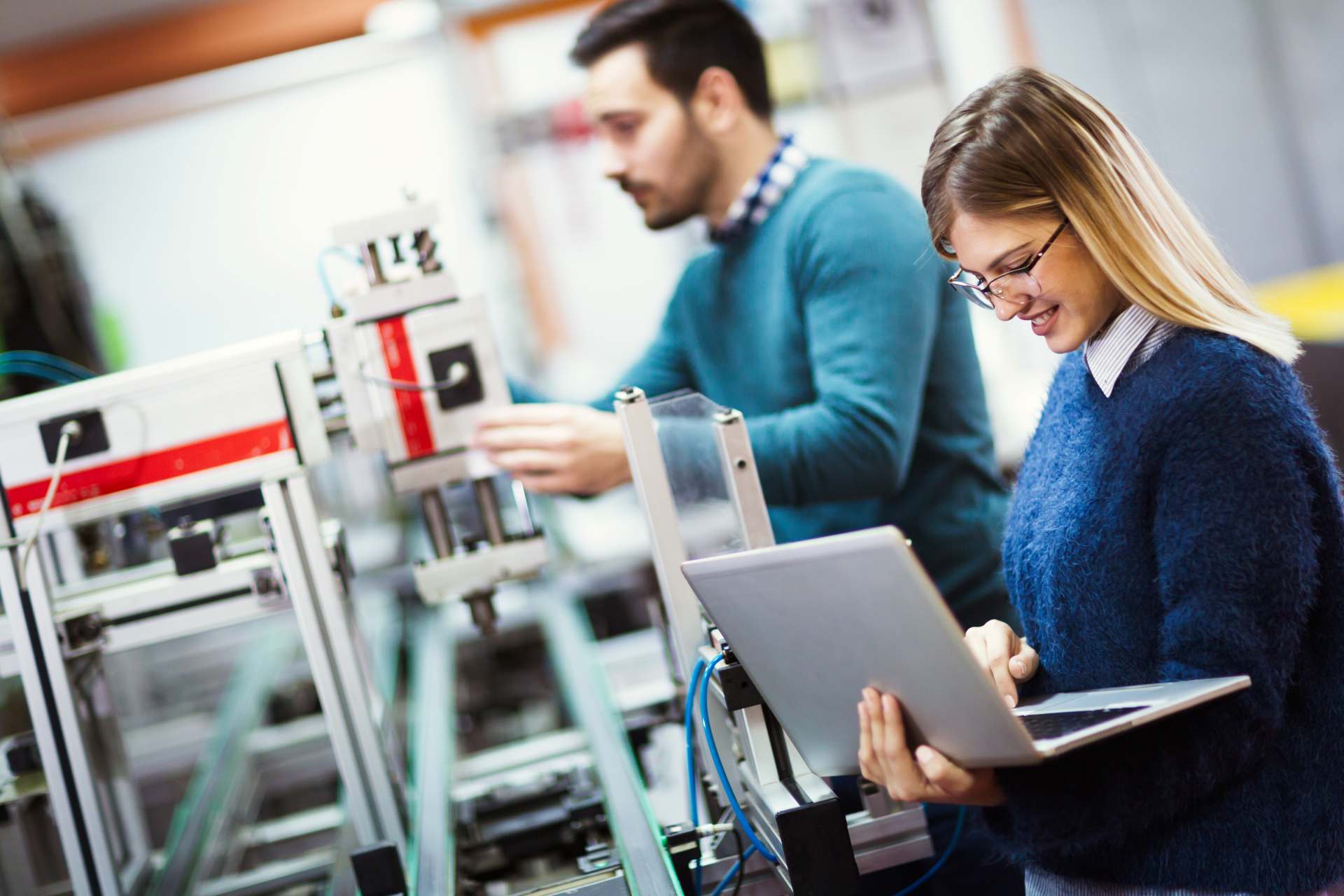 Engineers testing industrial equipment and systems