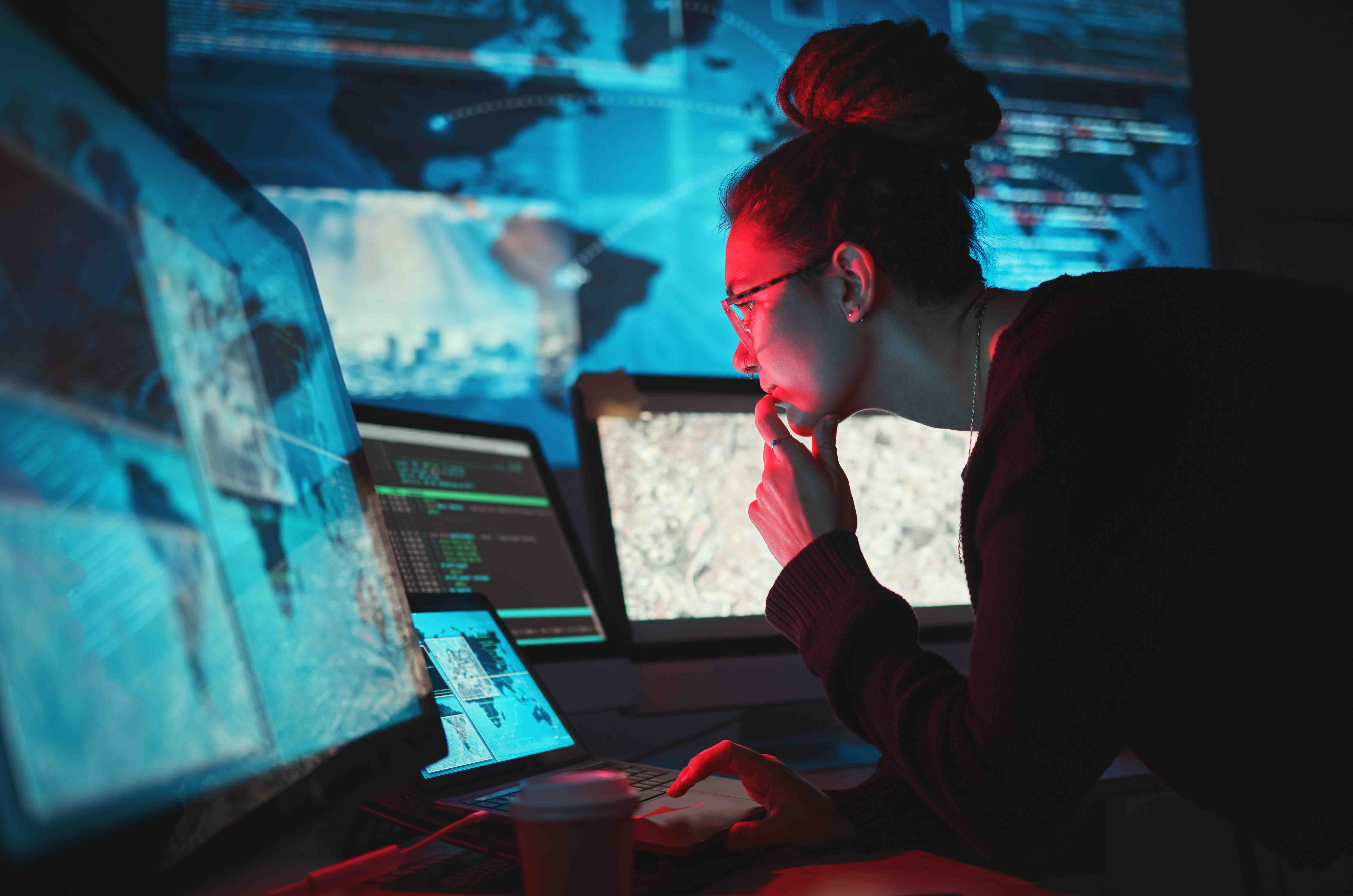 Focused woman working with multiple computer scree 2026 03 25 03 30 58 utc 1