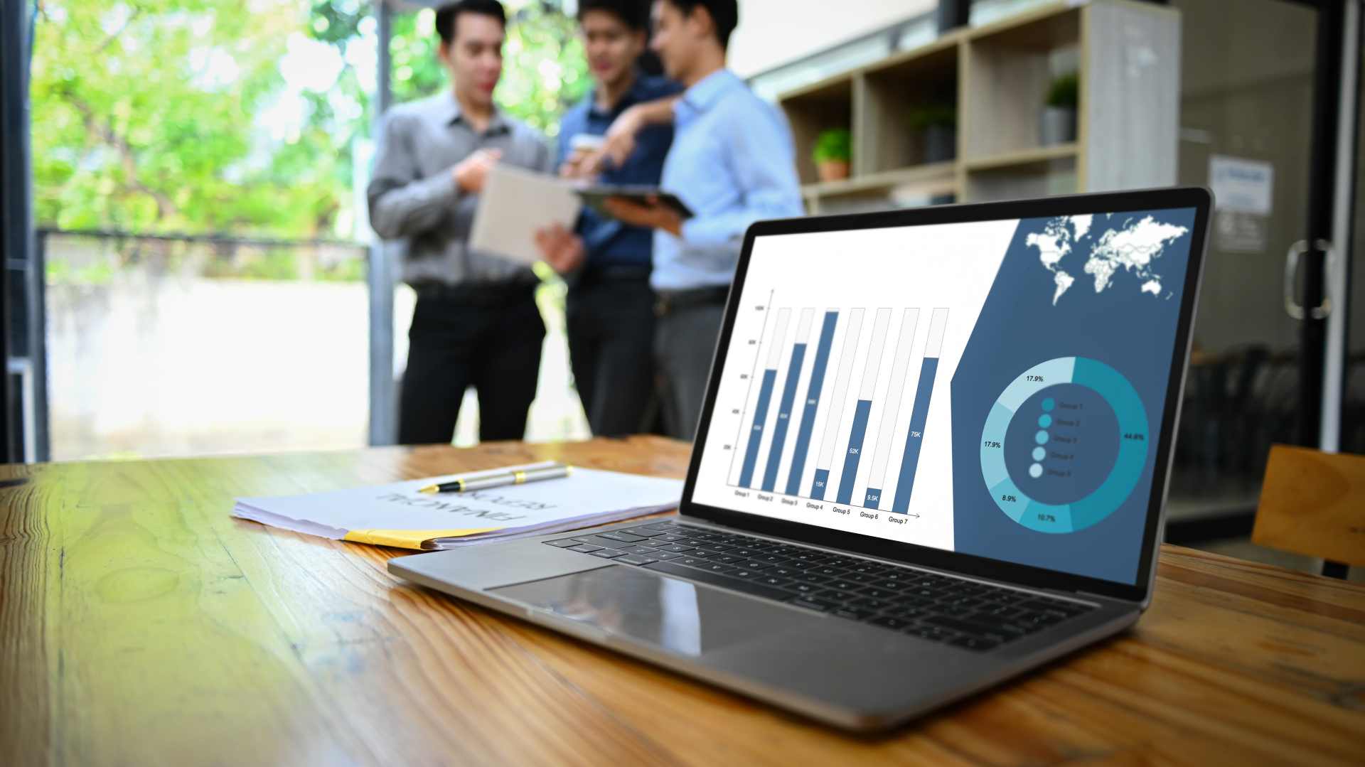 Business team reviewing AI performance testing and quality assurance analytics dashboard on laptop