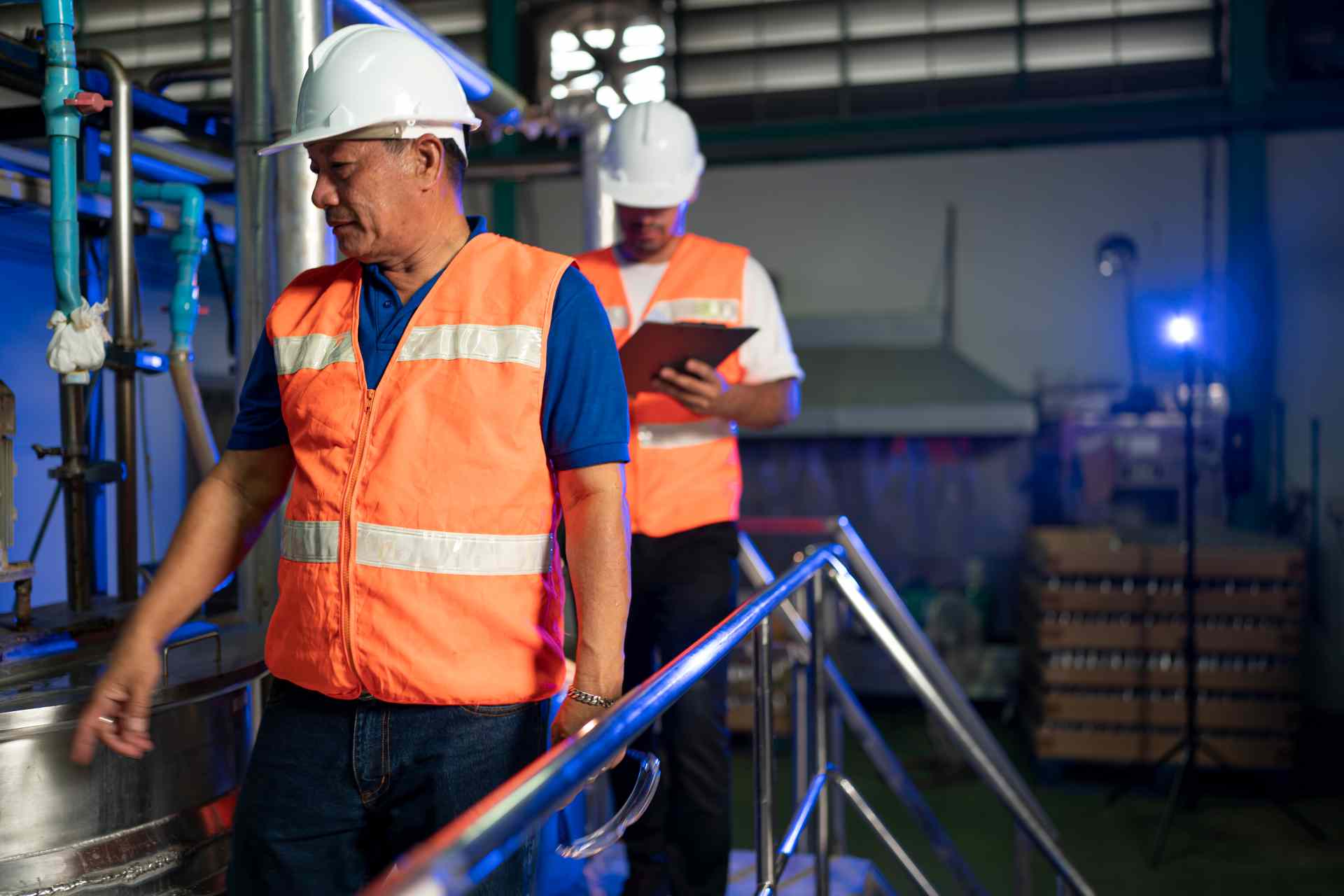 Mature engineers working in engineering factory 2026 03 18 05 03 21 utc