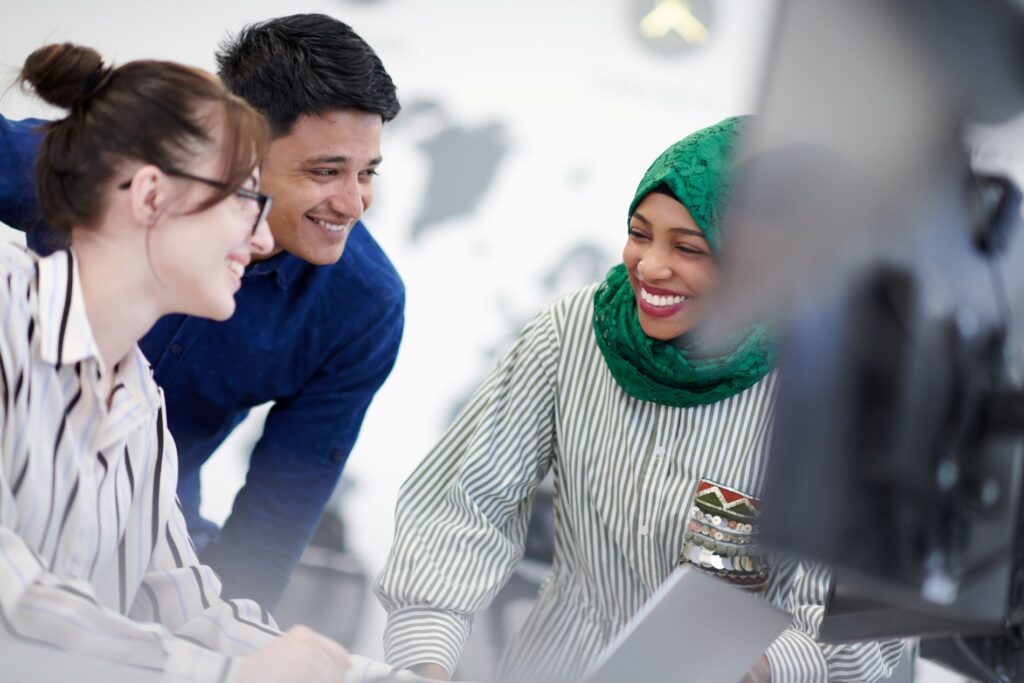 Smiling colleagues collaborating on a project in o 2026 01 11 11 11 41 utc