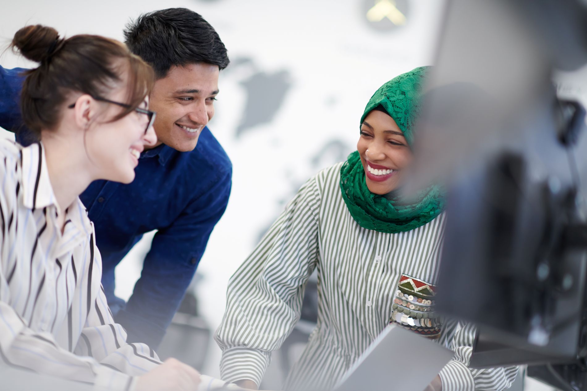 Smiling colleagues collaborating on a project in o 2026 01 11 11 11 41 utc