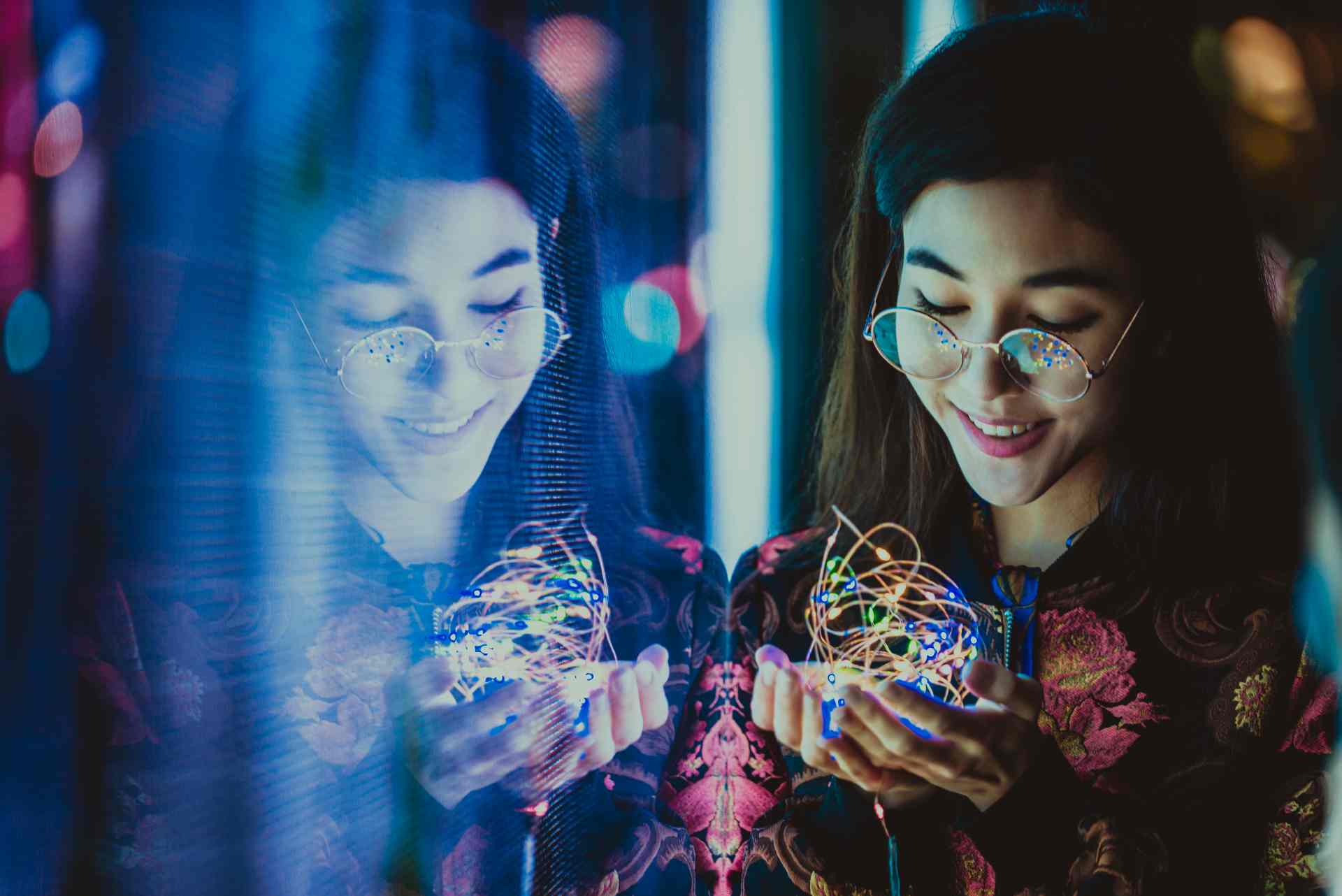 Women experiencing AI innovation representing responsible AI testing and quality assurance services