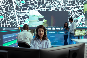 Team monitoring AI model validation and governance risk assessment in operations center
