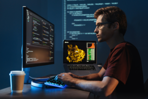 Developer building AI agent workflows and LLM orchestration on multi-screen workbench
