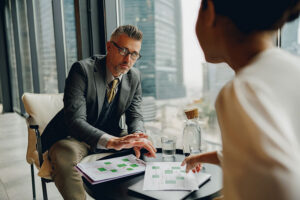 Executives discussing business reports