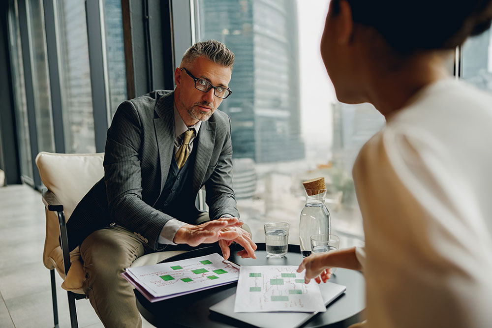 Executives discussing business reports