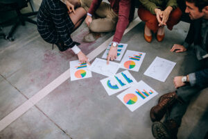 Team reviewing data charts and graphs