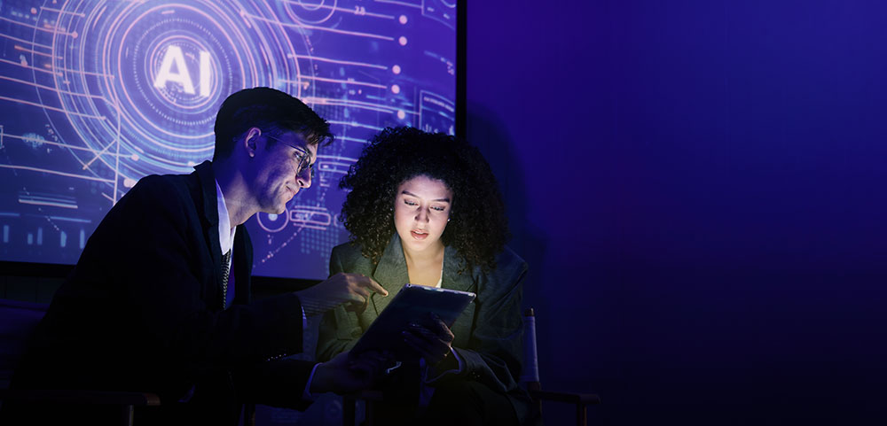People discussing AI technology with a digital tablet in a dark tech environment