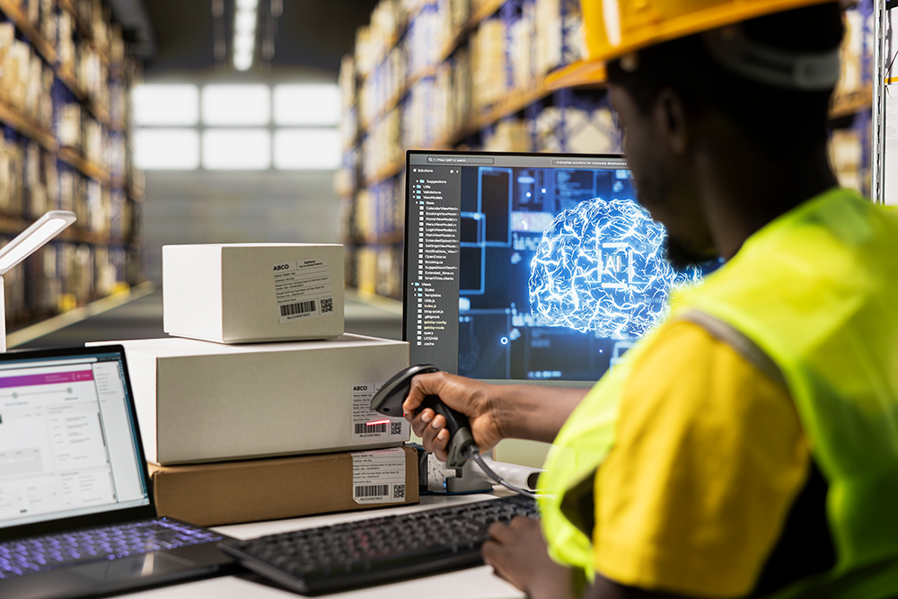 Warehouse worker scanning packages with AI-Powered Quality Engineering data display