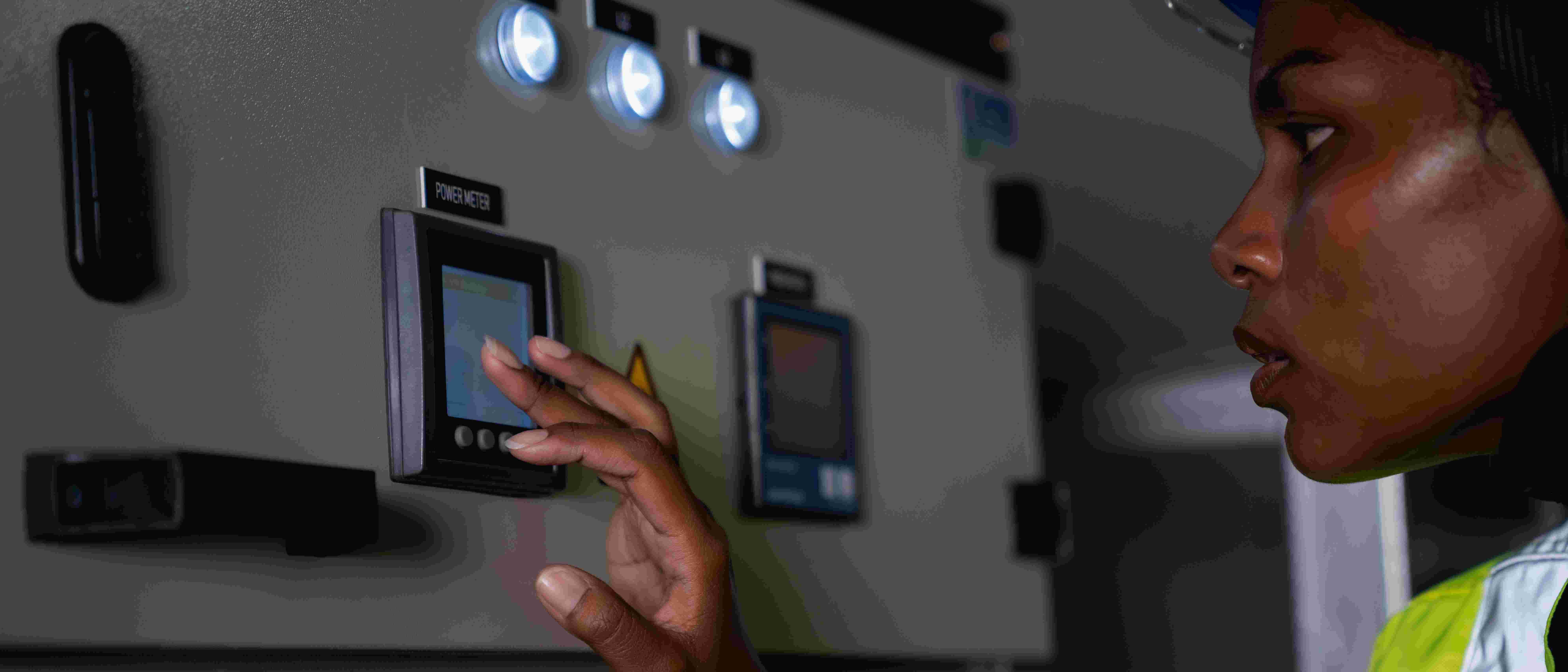 Person conducting Test Environment Automation on control panel