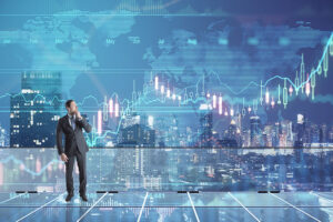 Businessman viewing global financial market data and stock charts