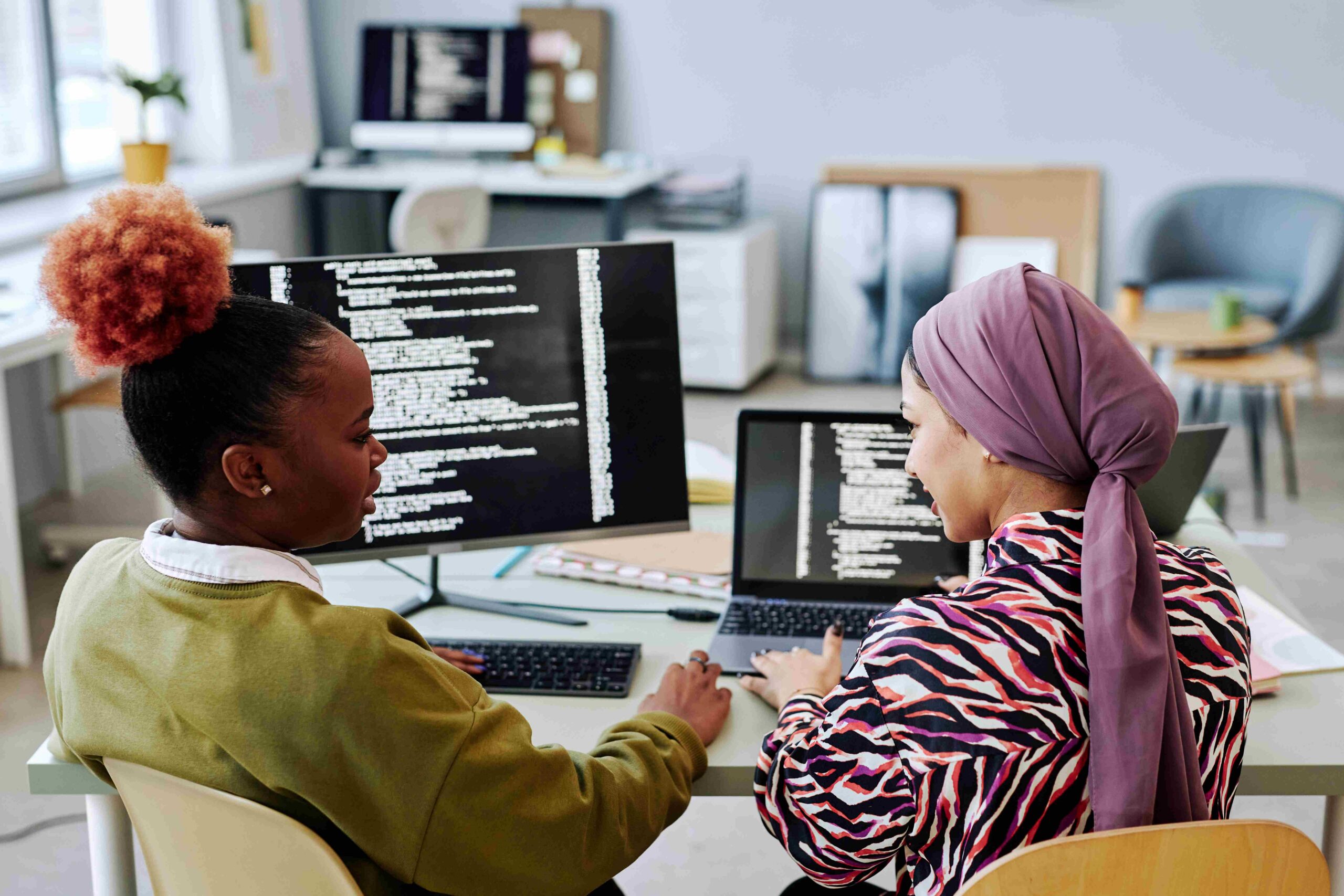 Team conducting Cross-Platform Testing on devices