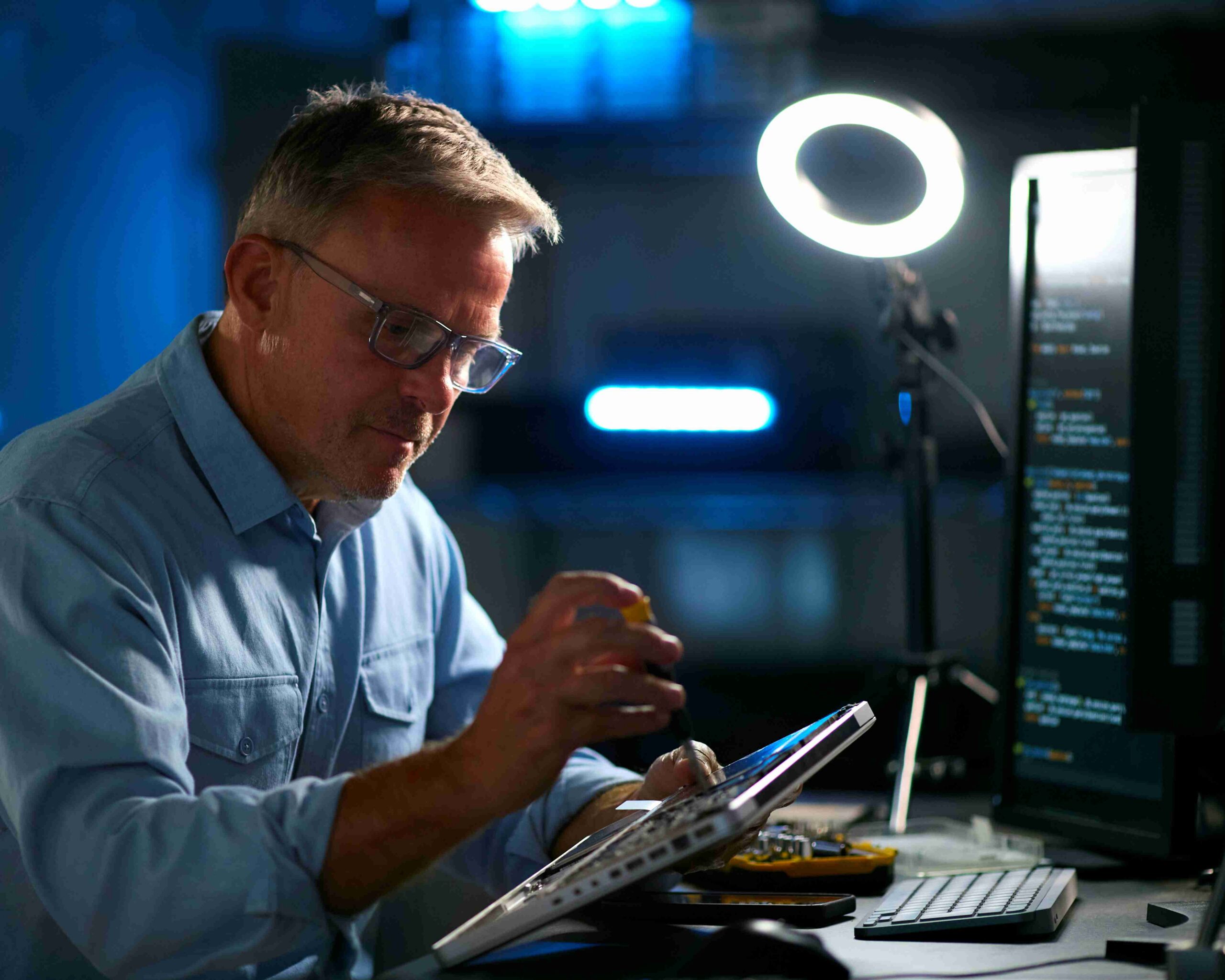 Engineer performing API testing on hardware components in a lab setting