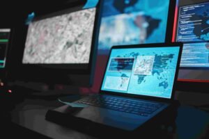 Laptop displaying test data on world map