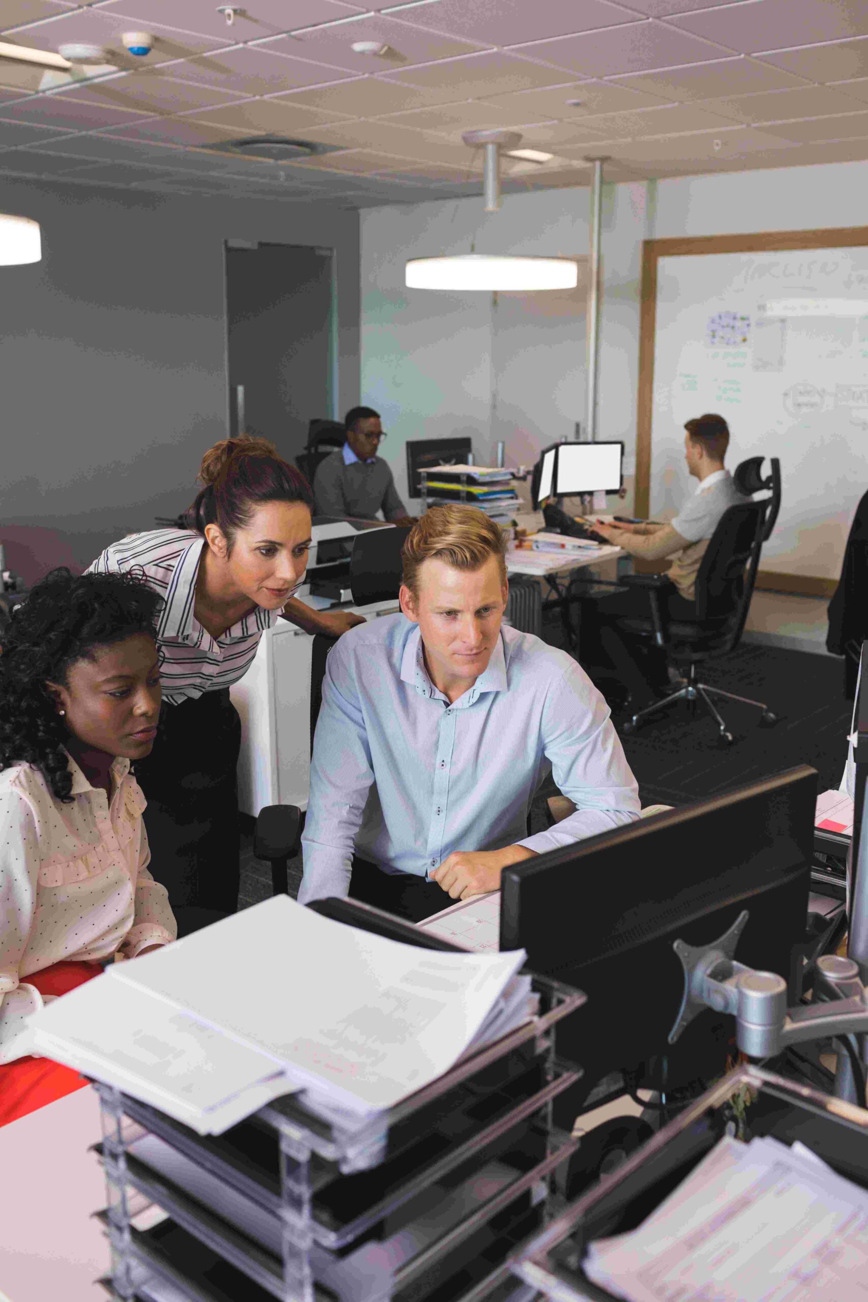 Team reviewing CRM Quality Assurance results together
