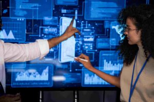 People analyzing data sub-setting on digital screen