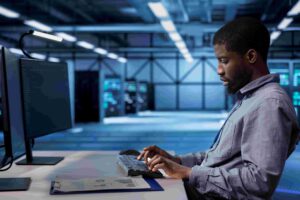 Person managing Synthesized test data platform at desk