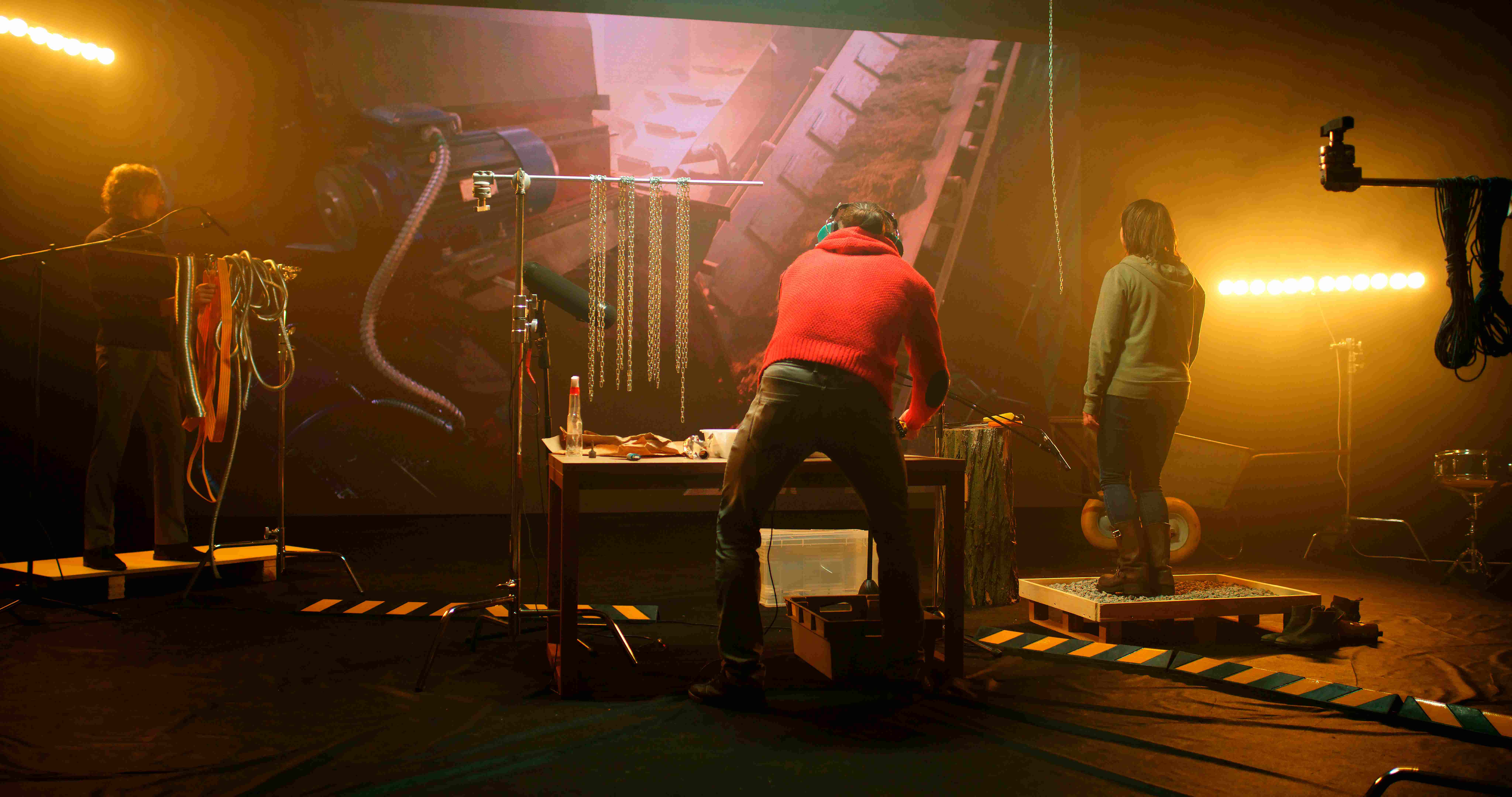 People conducting QC on demand rig testing