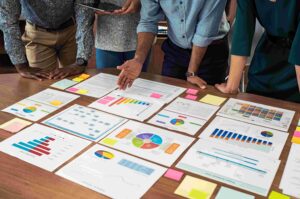 Colleagues analyzing colorful graphs together