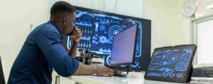 Engineer analyzing technical system diagrams
