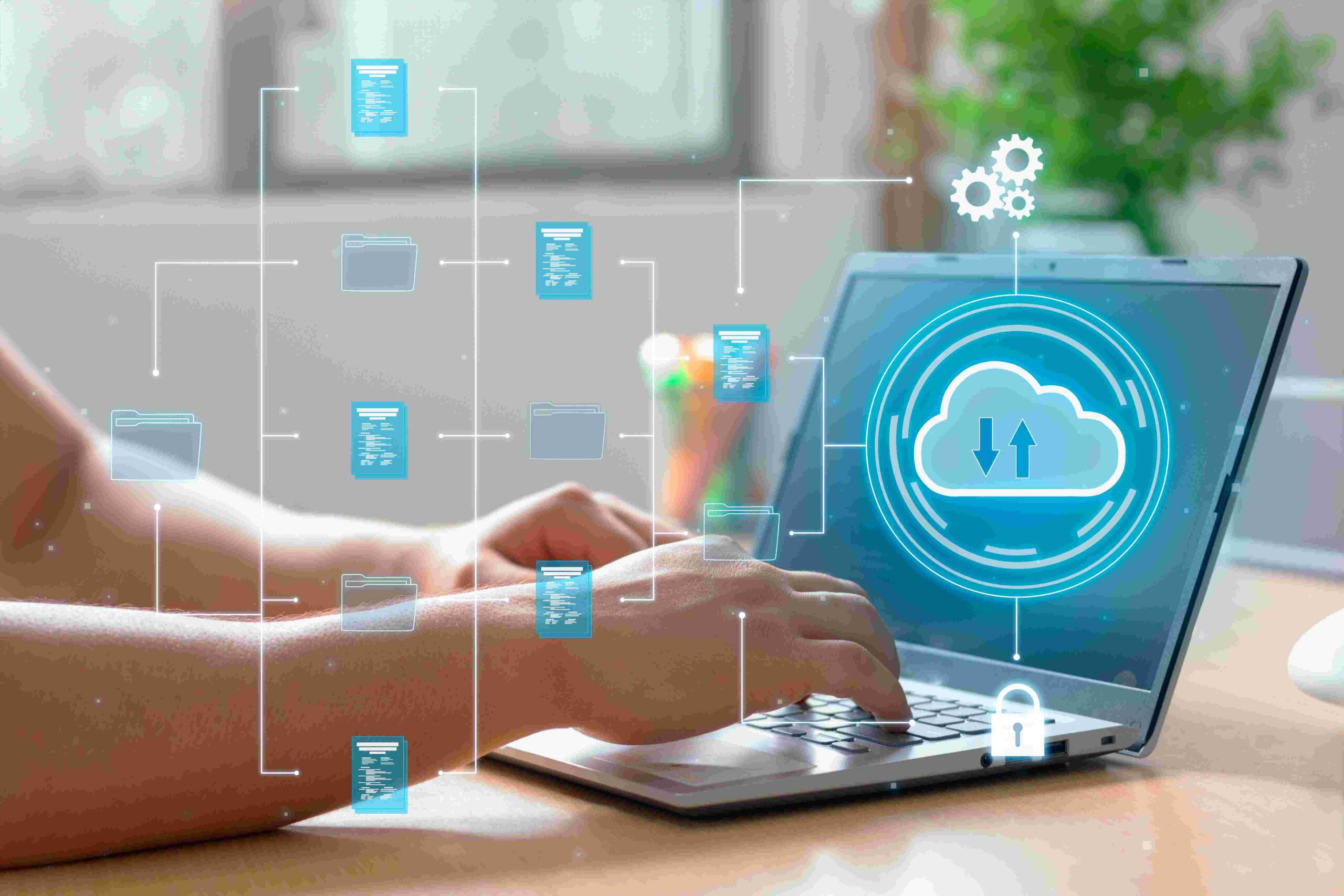Person using laptop with digital cloud upload graphic