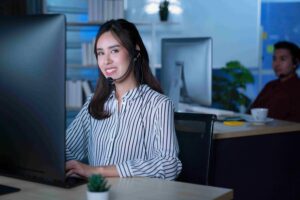 Support agent working at computer