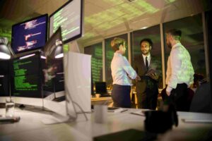 Colleagues discussing Synthesized data platform in office