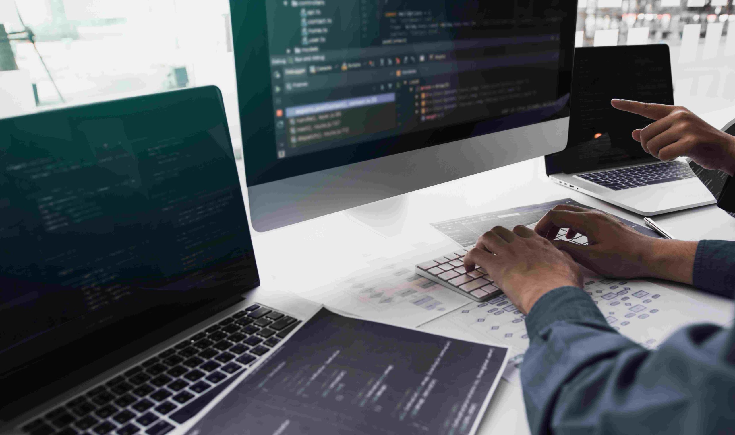 tester writing automated test scripts with AI-assisted scripting tools