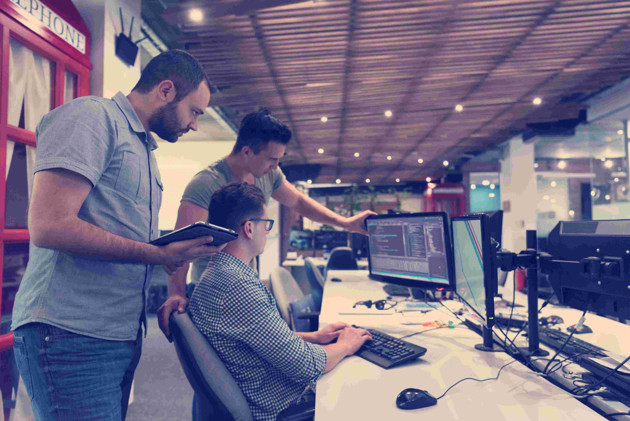 automation engineers working together on a client testing project